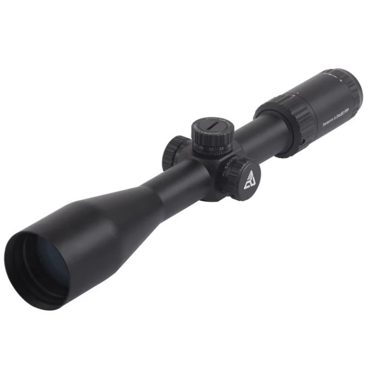 Black rifle scope with adjustment knobs and eyepiece, shown in close-up.