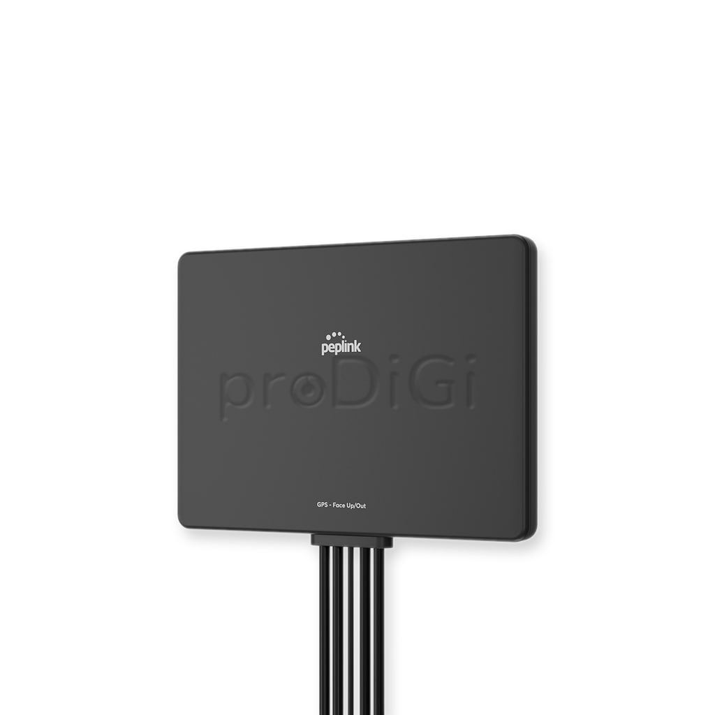 Black Peplink proDiGi GPS device with multiple cables extending from the bottom, mounted from the back of a panel.