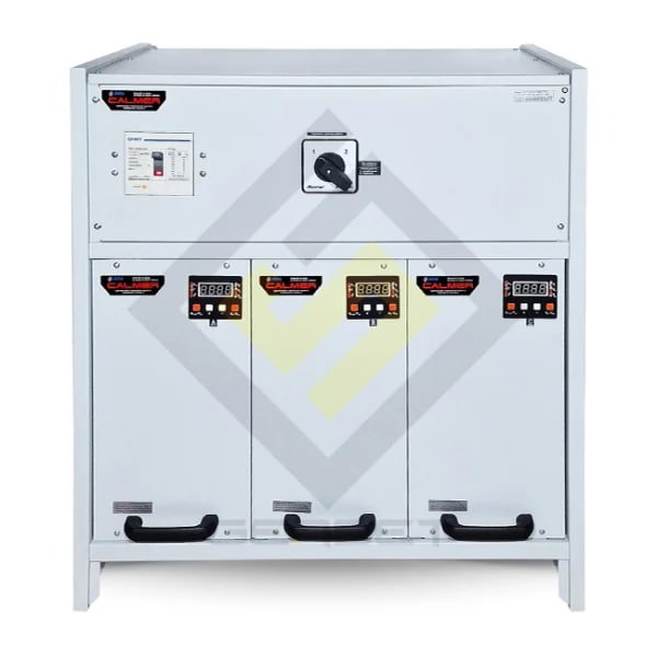 Industrial electrical control cabinet with three lower compartments displaying digital meters and large handles, used for power distribution in a facility.