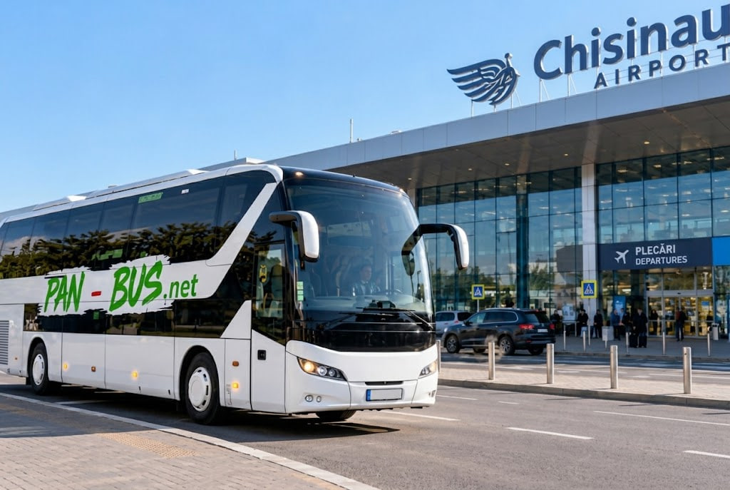 White coach bus with PAN-BUS.net branding parked in front of Chisinau Airport terminal; departures sign visible.